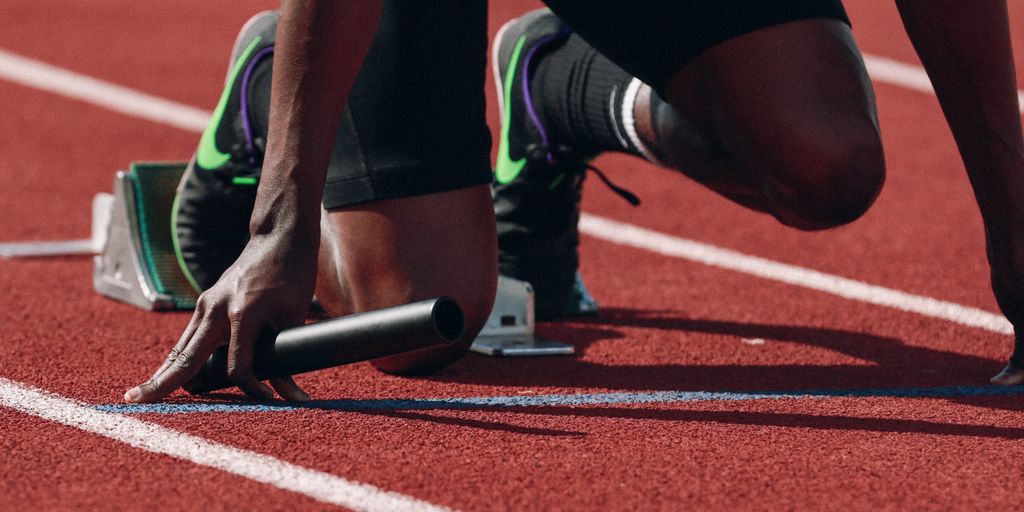 athlete analyzing foot biomechanics in a sports lab